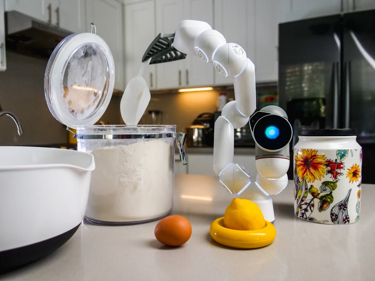 Mastering the First Impression: Your intriguing post title goes here A futuristic kitchen robot assists with ingredients on a countertop.